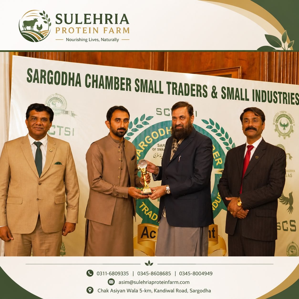 Asim Sulehria accepting a trophy for quality commitment